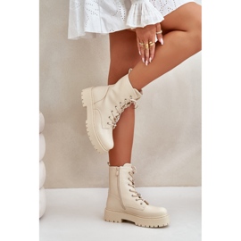 Insulated women's boots with beige pins 3 Insulated women's boots with beige pins 3