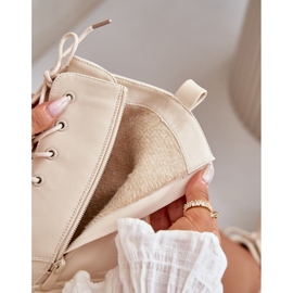 Insulated women's boots with beige pins 2 Insulated women's boots with beige pins 2