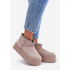 Light beige snow boots on a platform with decorative embroidery 1