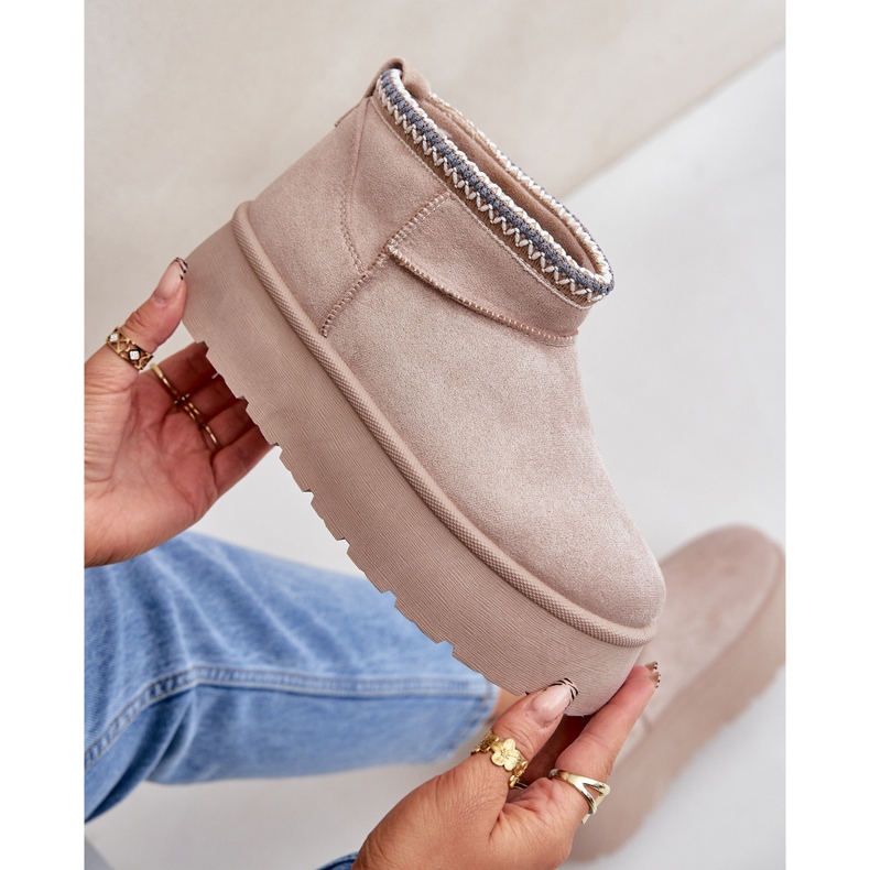 Light beige snow boots on a platform with decorative embroidery 2