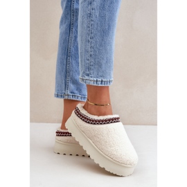 Light beige sheepskin slippers on a platform with fur 2