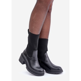 Boots with a sock on a massive black heel 1