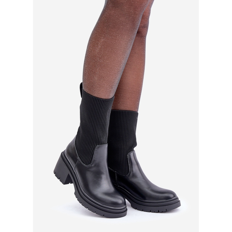 Boots with a sock on a massive black heel 1