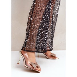 Transparent high-heeled sandals with a shiny gold bow golden 2