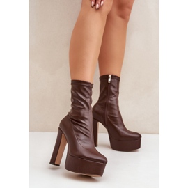 Dark brown high-heeled boots with a stiletto heel and a platform 2