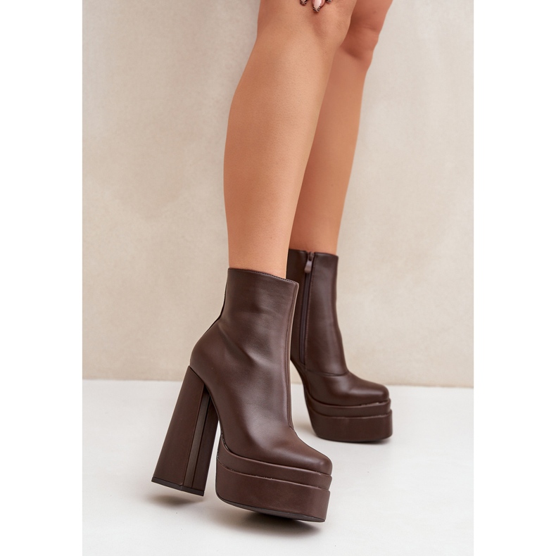 Warm chocolate ankle boots on a massive platform and high heel brown 2