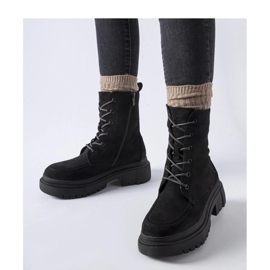 Black worker boots with trappers on a massive Riel - Solea sole 2