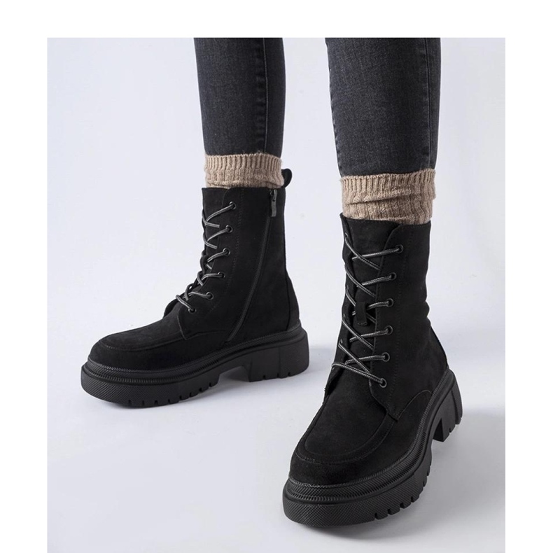 Black worker boots with trappers on a massive Riel - Solea sole 2