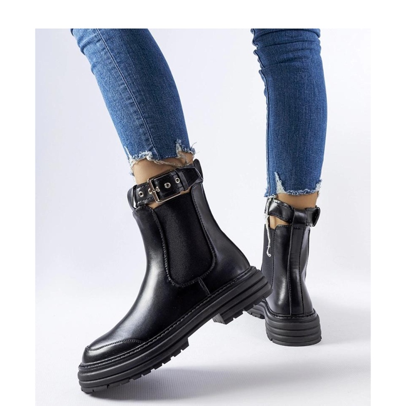 Black ankle boots with a decorative clasp 1