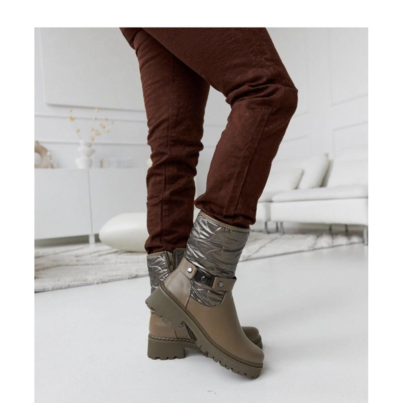 Green insulated ankle boots with a decorative strap 1