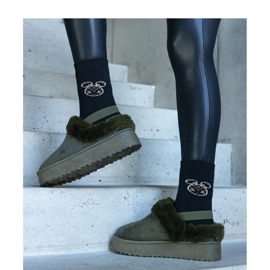 Green platform slippers decorated with fur and with an elastic band at the heel 1