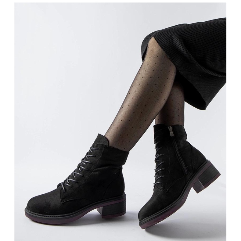 Black classic ankle boots with a purple sole 1