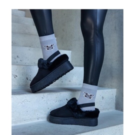 Black platform slippers decorated with fur and with an elastic band at the heel 1