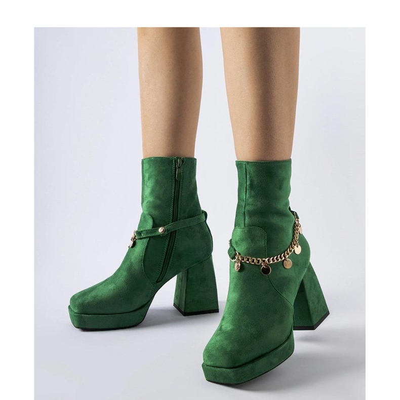 Green insulated ankle boots with a pendant 1