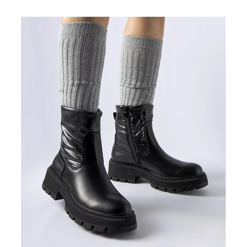 Black ankle boots with a decorative upper 1