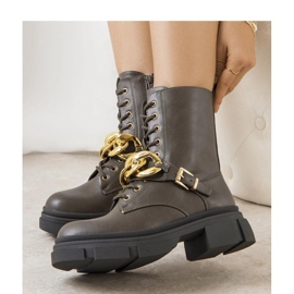 Green hiking boots with a chain 1