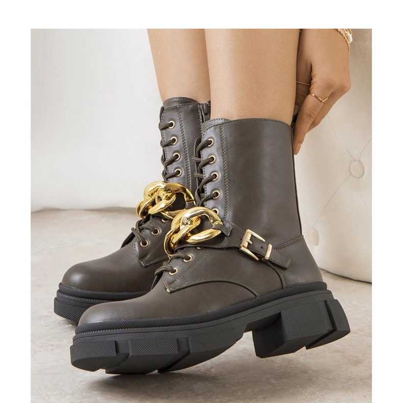 Green hiking boots with a chain 1