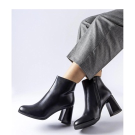 Black insulated ankle boots with a decorative heel 1