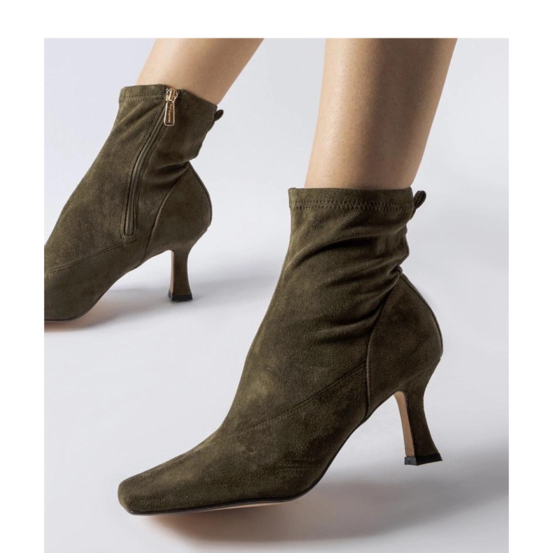 Green low-heeled ankle boots 1