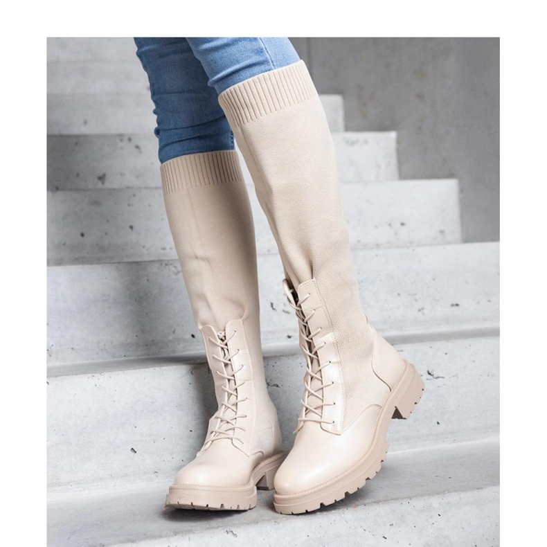 Beige slip-on boots with a flexible fabric upper 1