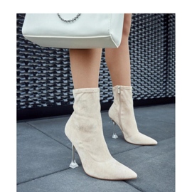Beige ankle boots with a decorative heel 1