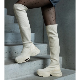 Beige slip-on boots with a flexible upper and a massive sole 3