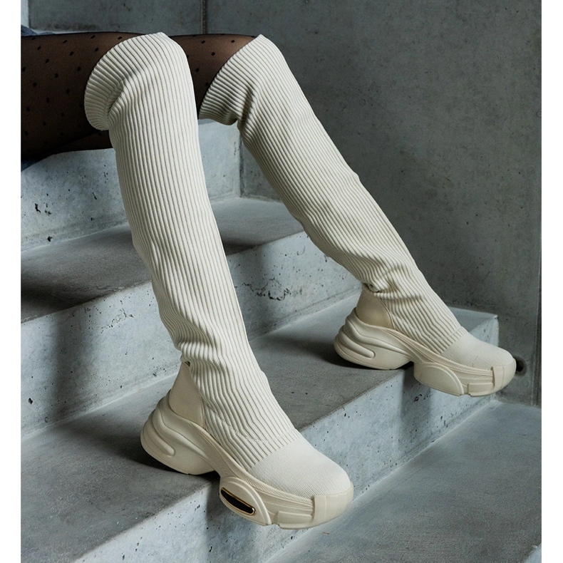 Beige slip-on boots with a flexible upper and a massive sole 1