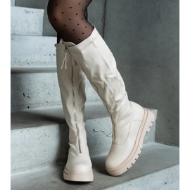 Beige eco-leather boots with a flat heel decorated with a zipper 2