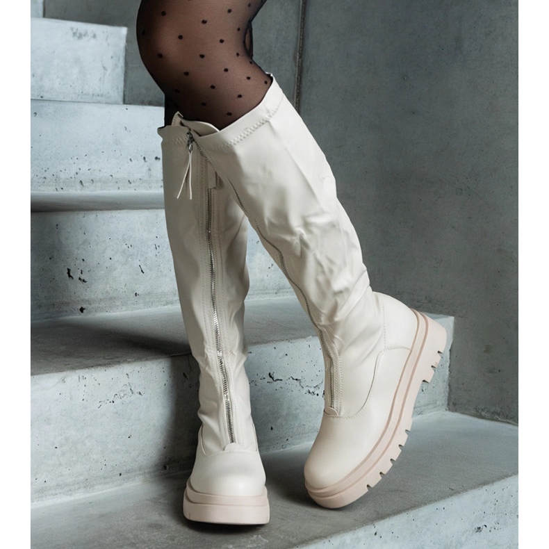 Beige eco-leather boots with a flat heel decorated with a zipper 2