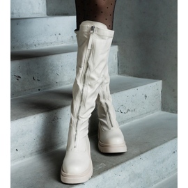 Beige eco-leather boots with a flat heel decorated with a zipper 1