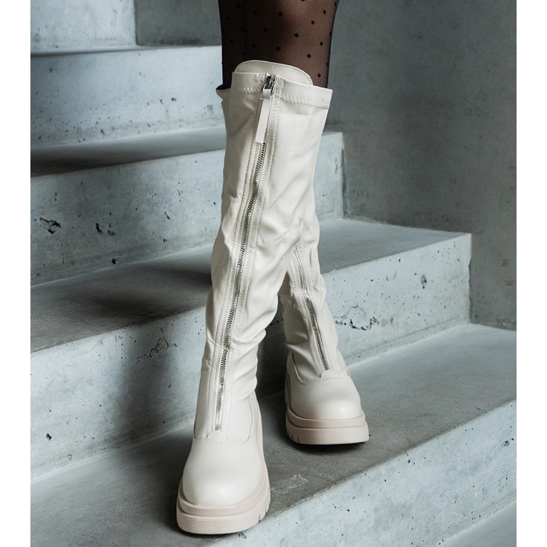 Beige eco-leather boots with a flat heel decorated with a zipper 1