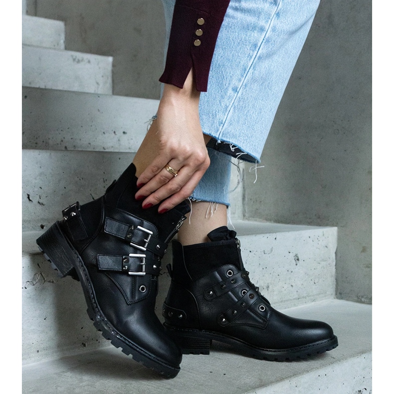 Black ankle boots decorated with studs with a flat heel 1