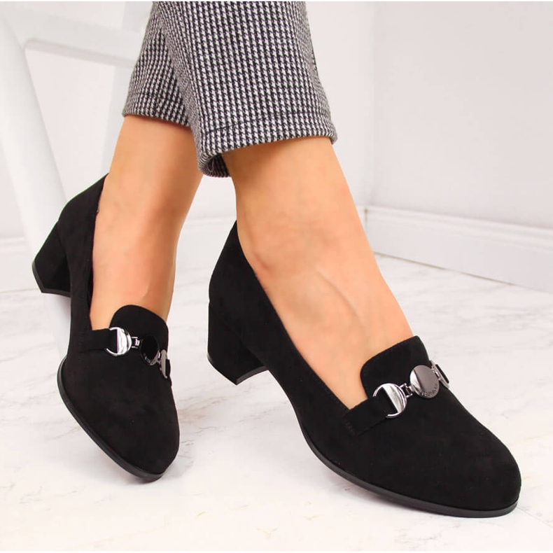 Women's black shoes with a block by Sergio Leone 1