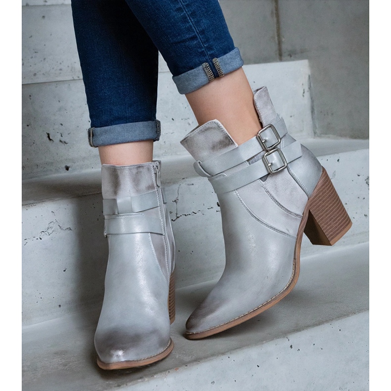 Silver high-heeled ankle boots decorated with a cutout 1