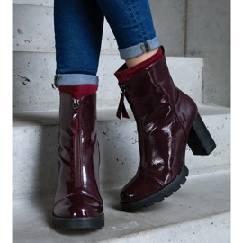 Burgundy patent ankle boots decorated with a clasp red 1