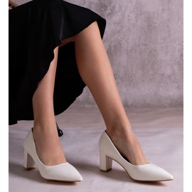 White pumps on the post 1