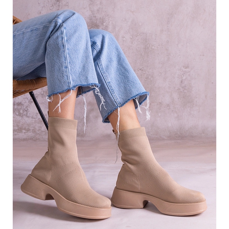 Beige ankle boots with a flexible upper 1