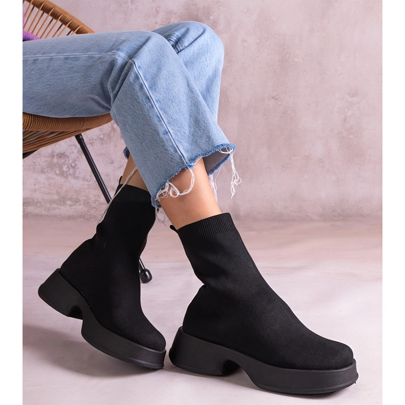 Black boots with a flexible upper 2