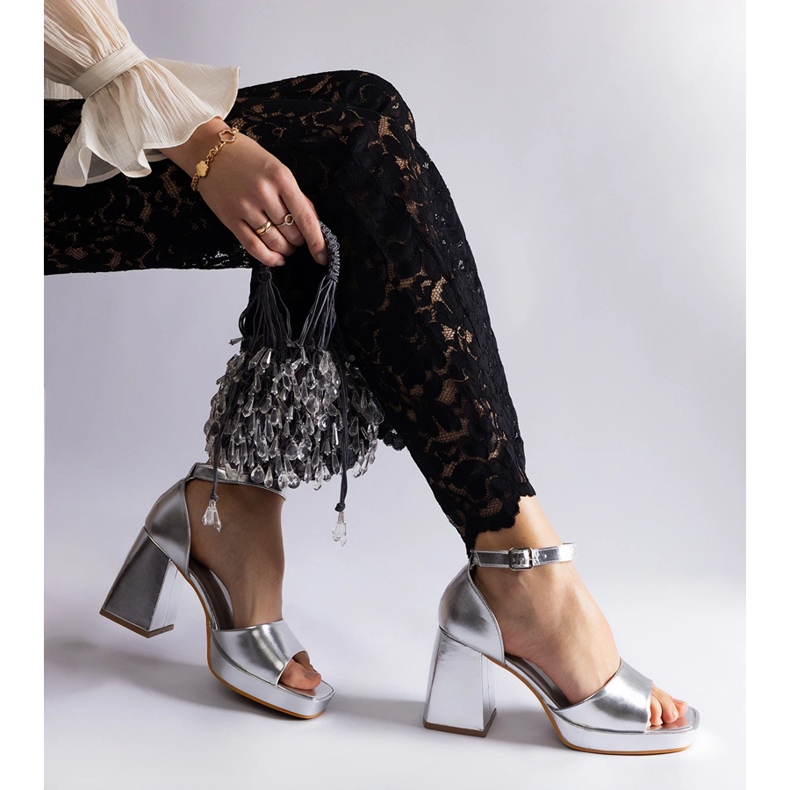 Silver women's sandals with a massive metallic heel 1