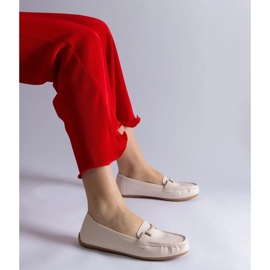 Beige classic eco leather loafers with an ornament 1