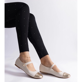 Beige and gold ballet flats with a patent toe, fastened with Velcro 1
