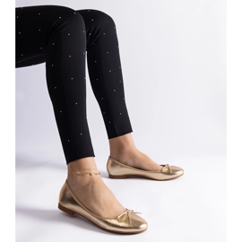 Gold ballerina shoes decorated with a bow golden 1