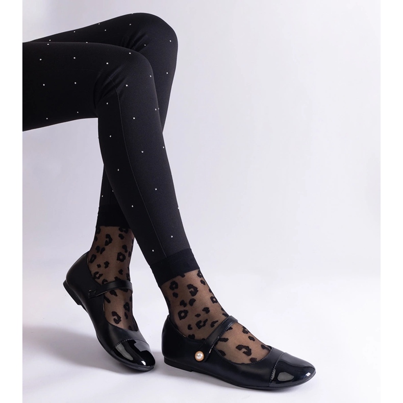 Black ballet flats with a patent toe, fastened with Velcro 1