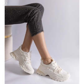Beige sports sneakers on a massive sole 2