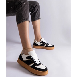 Black sneakers laced on the platform 1 Black sneakers laced on the platform 1