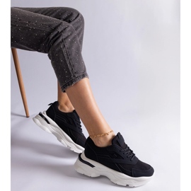 Black sneakers with a thick sole 2 Black sneakers with a thick sole 2