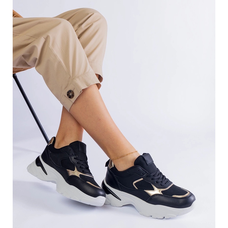 Black sneakers on a massive sole 1