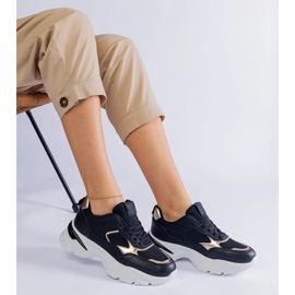 Black sneakers on a massive sole 2