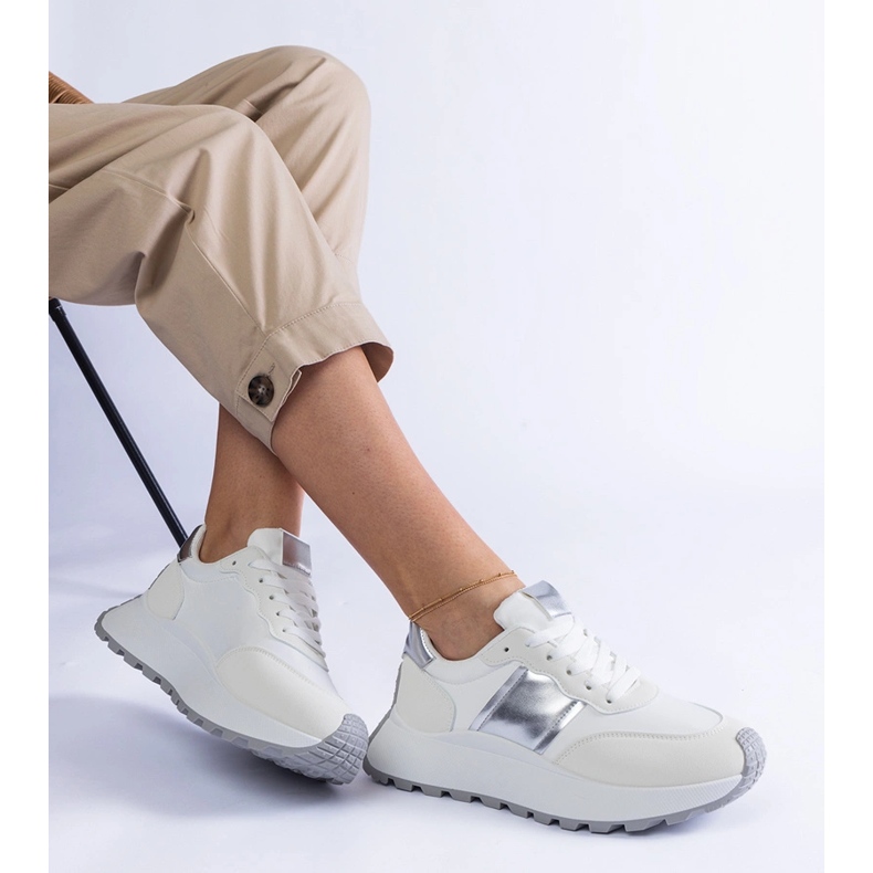 White sneakers on the platform 2