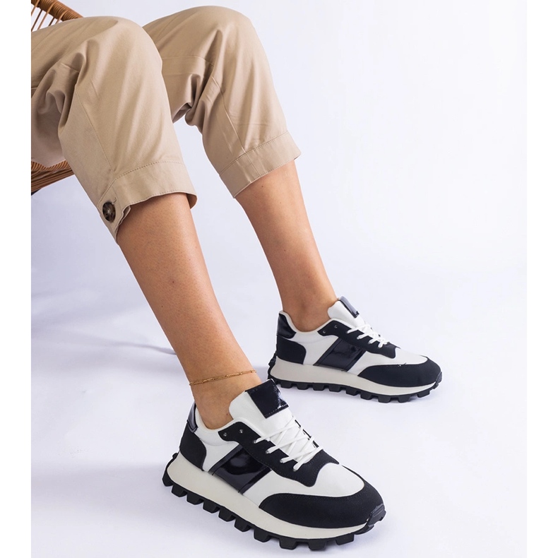 Black sneakers with a visible protector 2